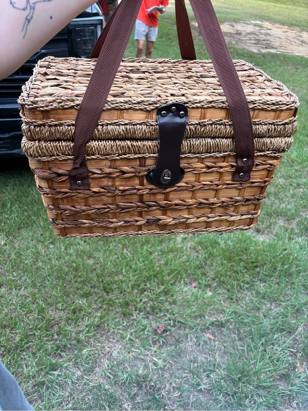 Woven Picnic Basket with Brown Straps and Leather Accents
